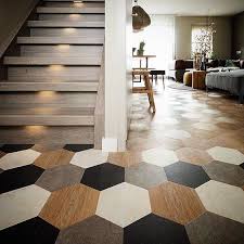 Hexagonal wood-effect and black and white floor tiles